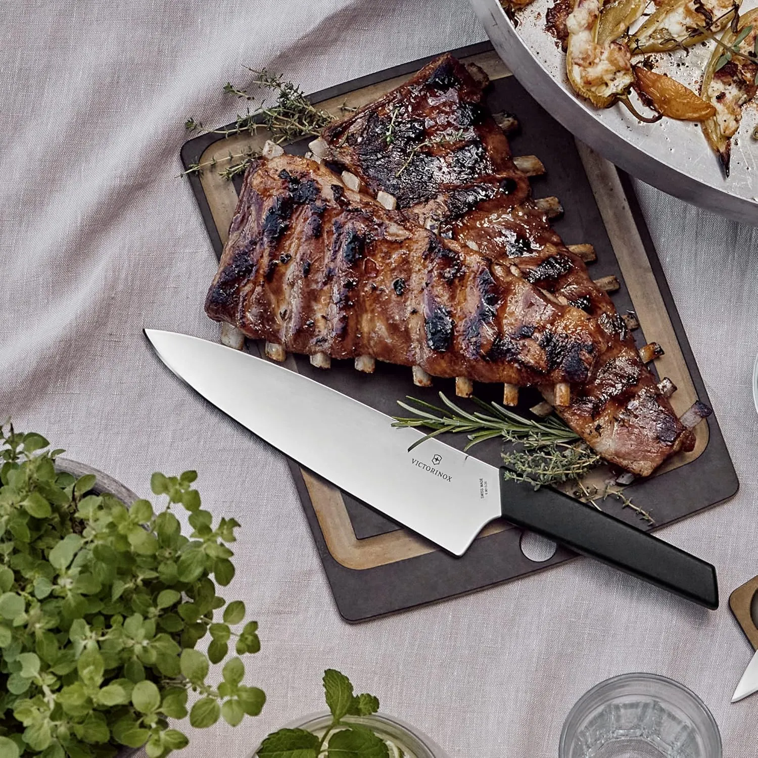 Victorinox Swiss Modern Chef's Knife - Kitchen Knife for Cutting Meat, Fruit & Vegetables - Premium Kitchen Accessories - Black Handle, 8"